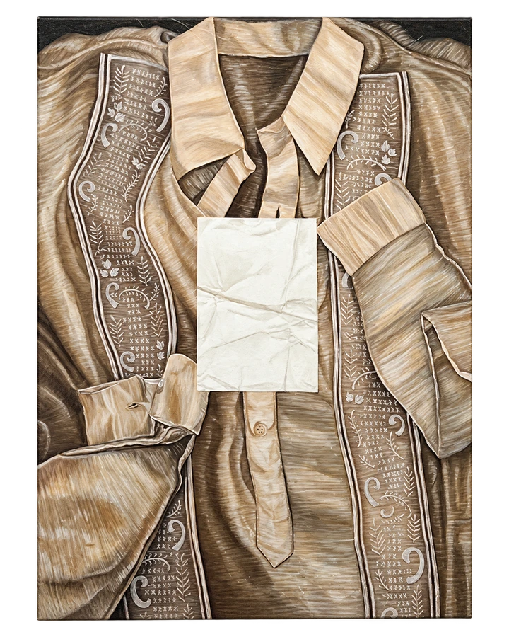An embroidered garment fills the canvas. A pale folded rectangle obscures its centre, setting intricate detail against interruption.